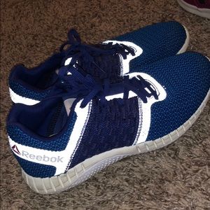 Reebok tennis shoes (unsure of the specific name)